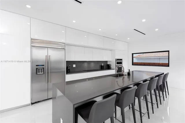 a view of a dining room with furniture and window