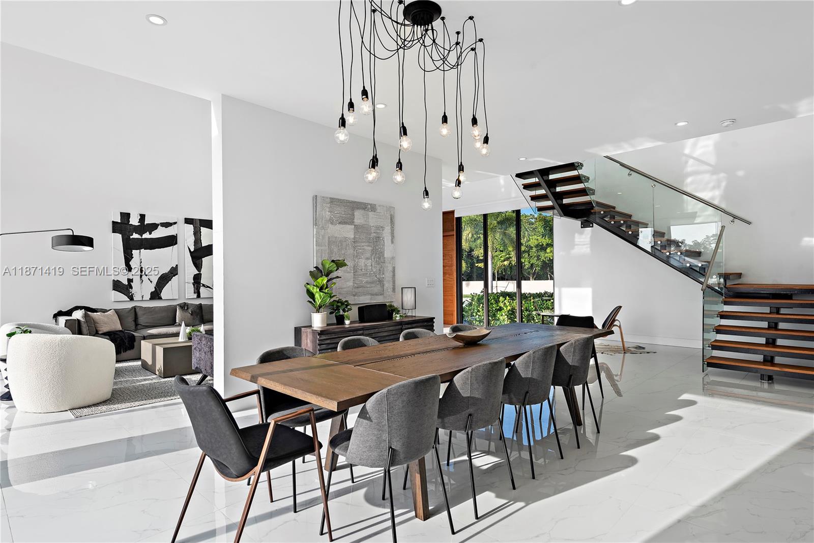 5420 Southwest 72nd Avenue Miami, FL 33155 - Photo 15 of 52 a view of a dining room with furniture and window