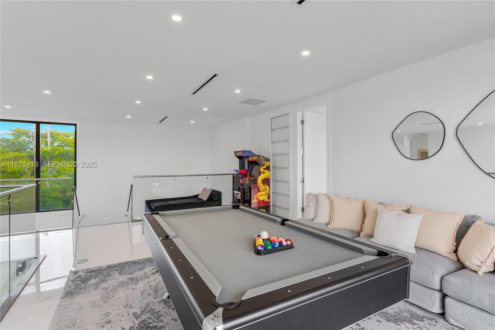 5420 Southwest 72nd Avenue Miami, FL 33155 - Photo 29 of 52 a view of a living room and kitchen