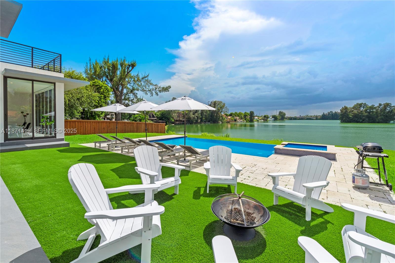5420 Southwest 72nd Avenue Miami, FL 33155 - Photo 34 of 52 a view of a table and chairs in the garden