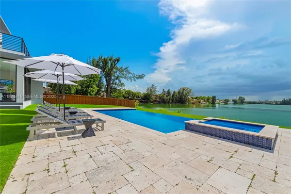 a view of yard with patio