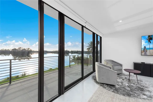 a bathroom with a double vanity sink mirror and shower