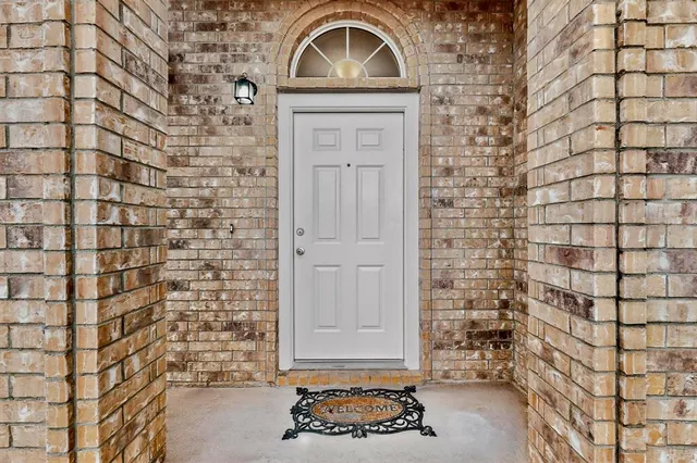 a front view of a house with a door