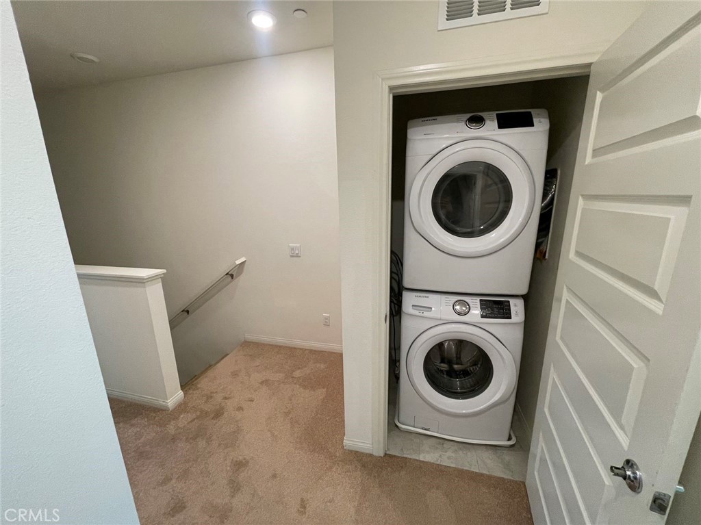 136 Unity Irvine, CA 92614 - Photo 12 of 15 a utility room with dryer and washer