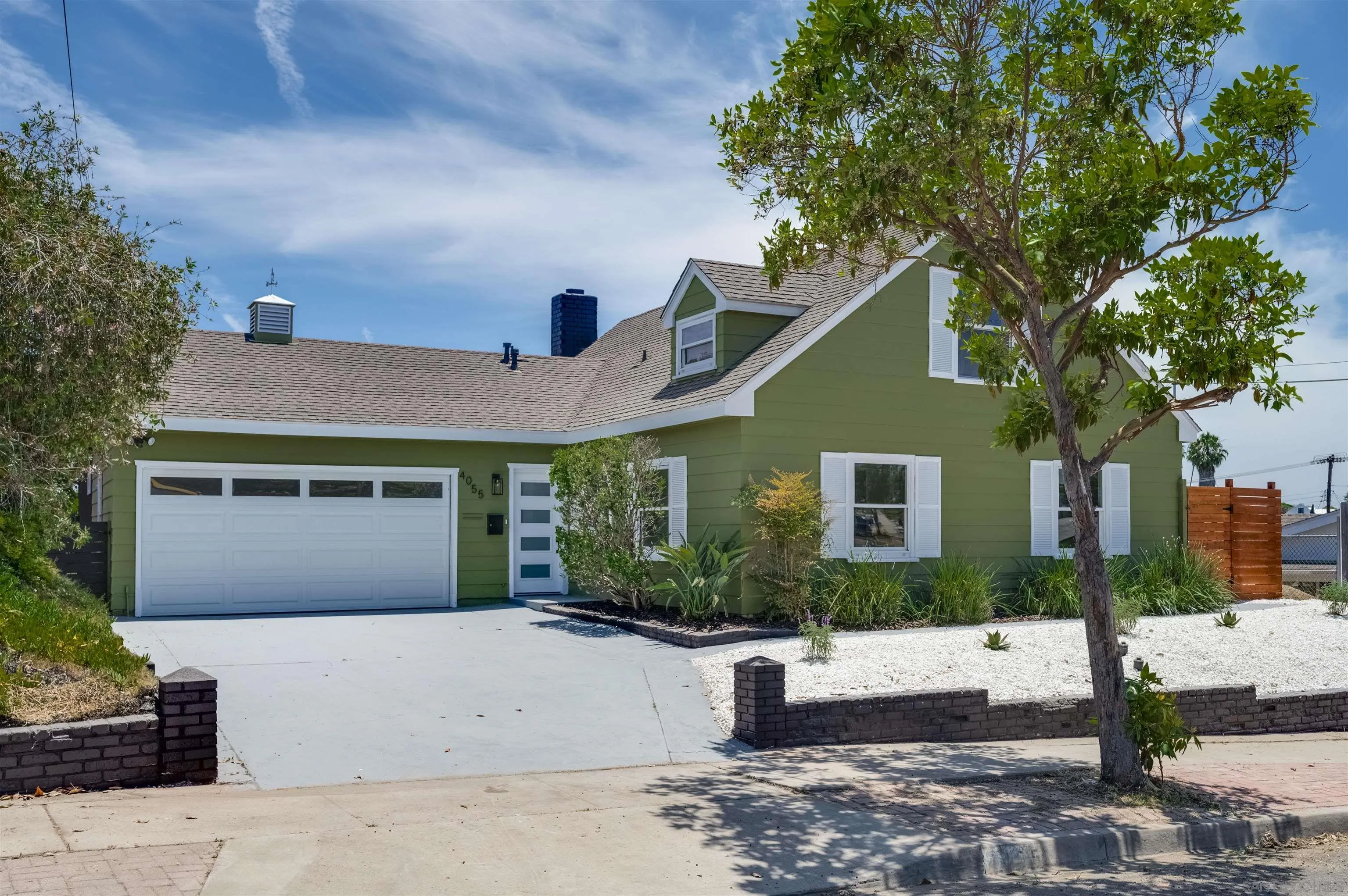 4055 Mt Albertine Avenue San Diego, CA 92111 - Photo 1 of 33 a front view of a house with a yard