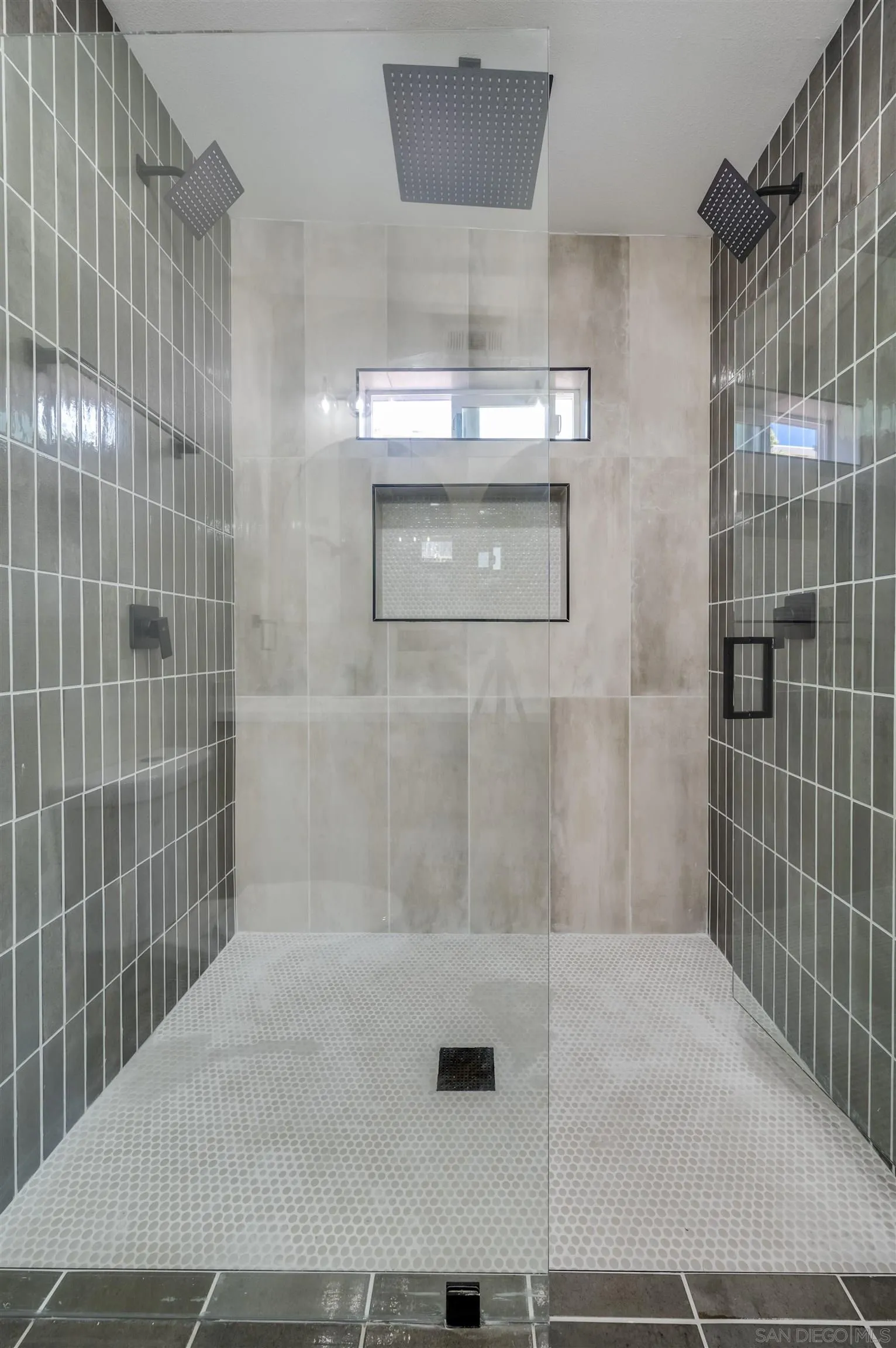 4055 Mt Albertine Avenue San Diego, CA 92111 - Photo 18 of 33 a bathroom with a shower