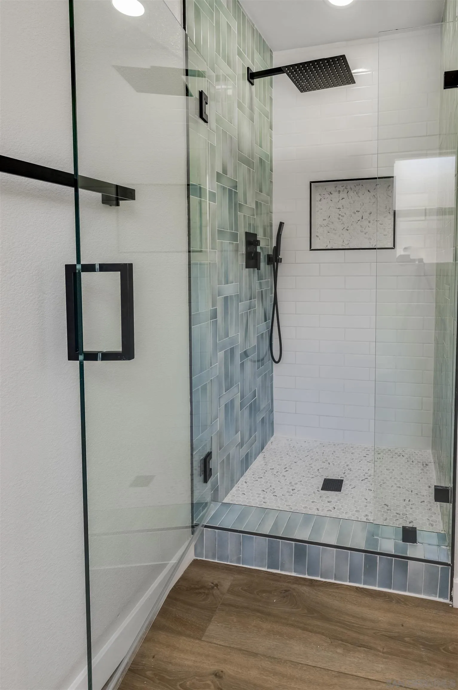 4055 Mt Albertine Avenue San Diego, CA 92111 - Photo 21 of 33 a bathroom with a shower
