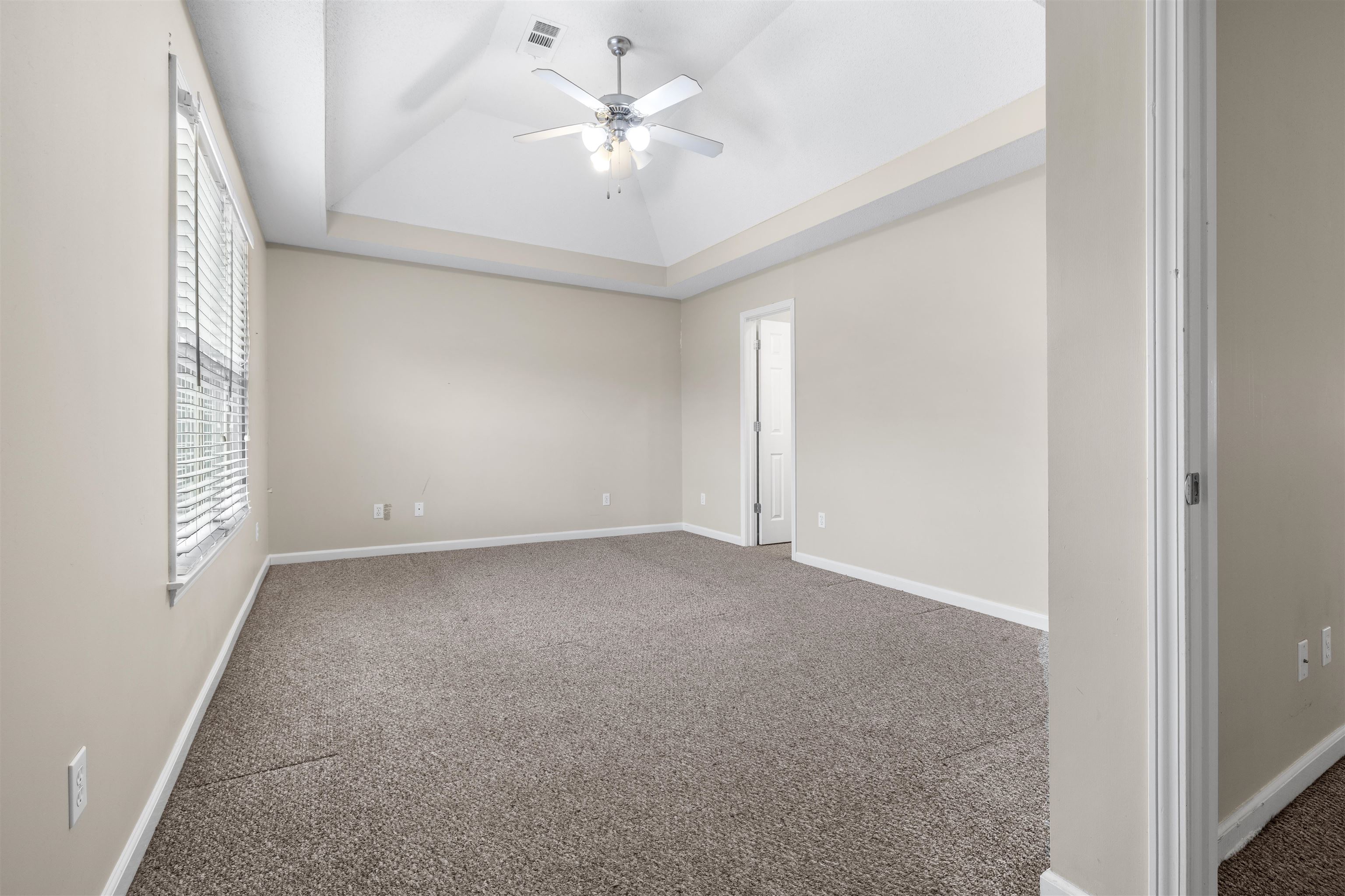 220 Terry Road Somerville, TN 38068 - Photo 16 of 29 an empty room with windows and fan