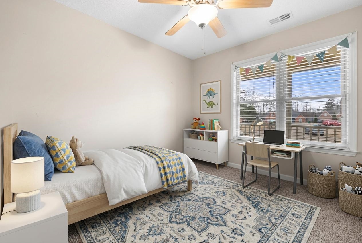 220 Terry Road Somerville, TN 38068 - Photo 19 of 29 a bedroom with a bed and wooden floor