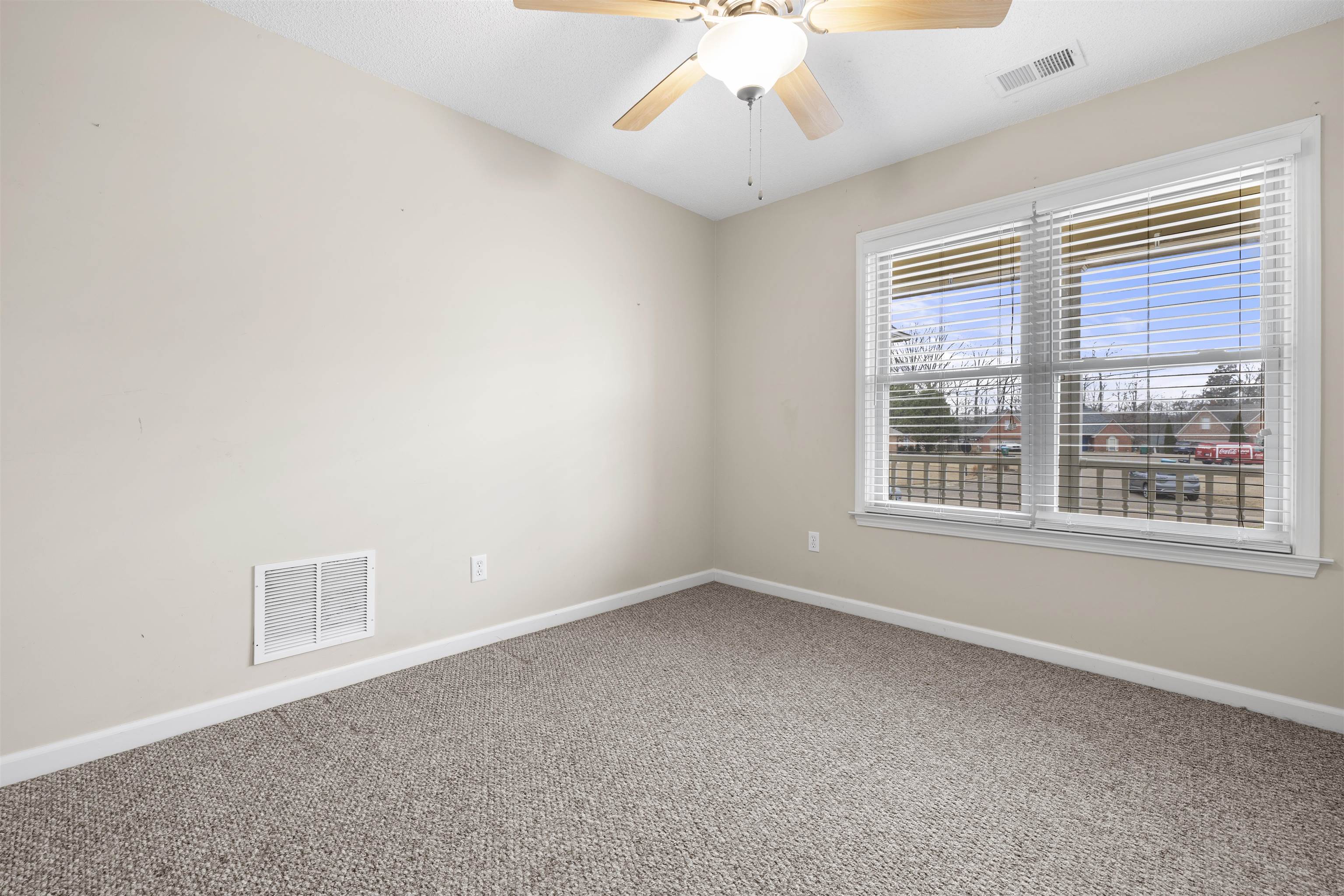 220 Terry Road Somerville, TN 38068 - Photo 20 of 29 an empty room with a window