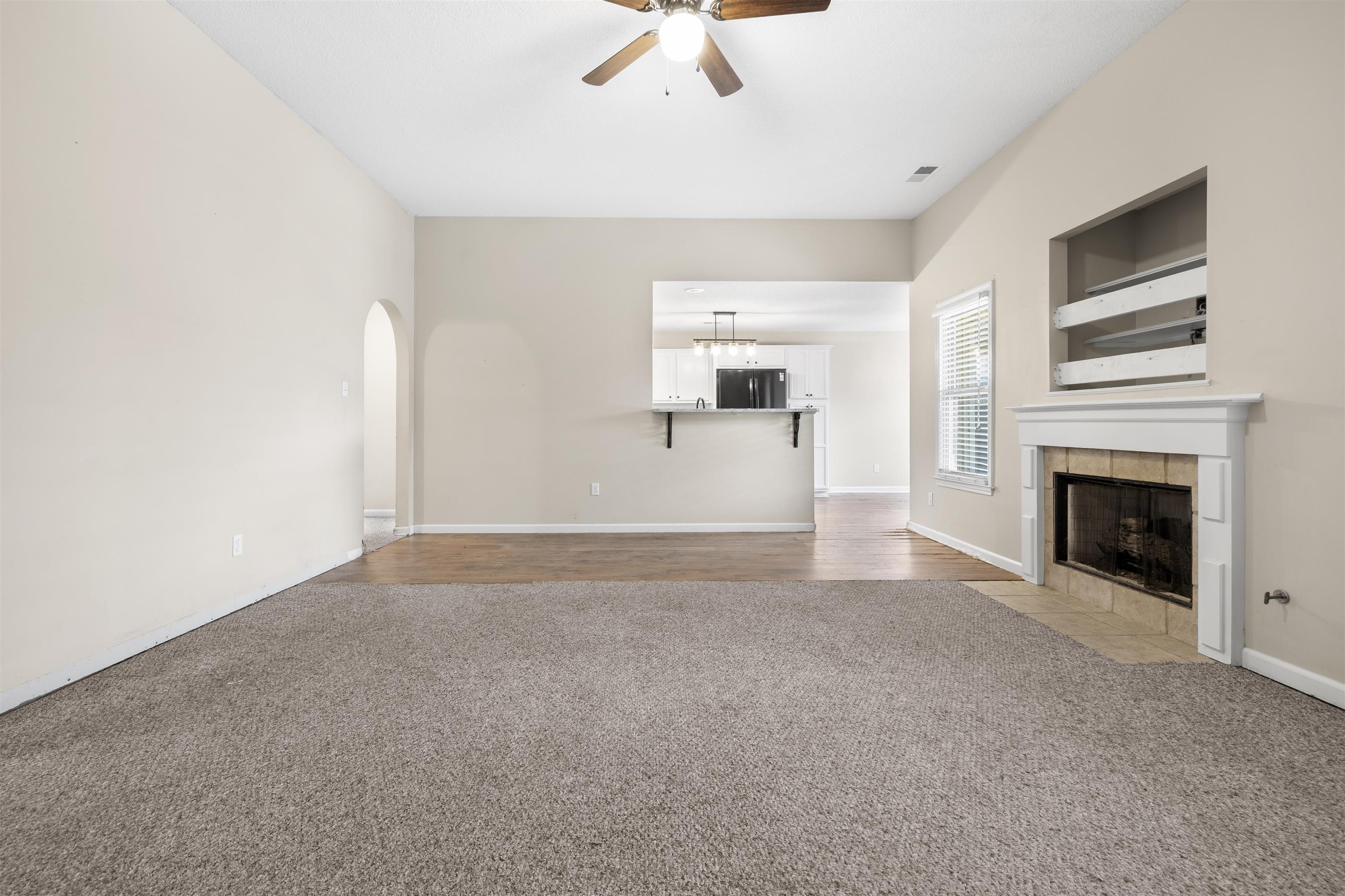 220 Terry Road Somerville, TN 38068 - Photo 7 of 29 a view of empty room with a fireplace