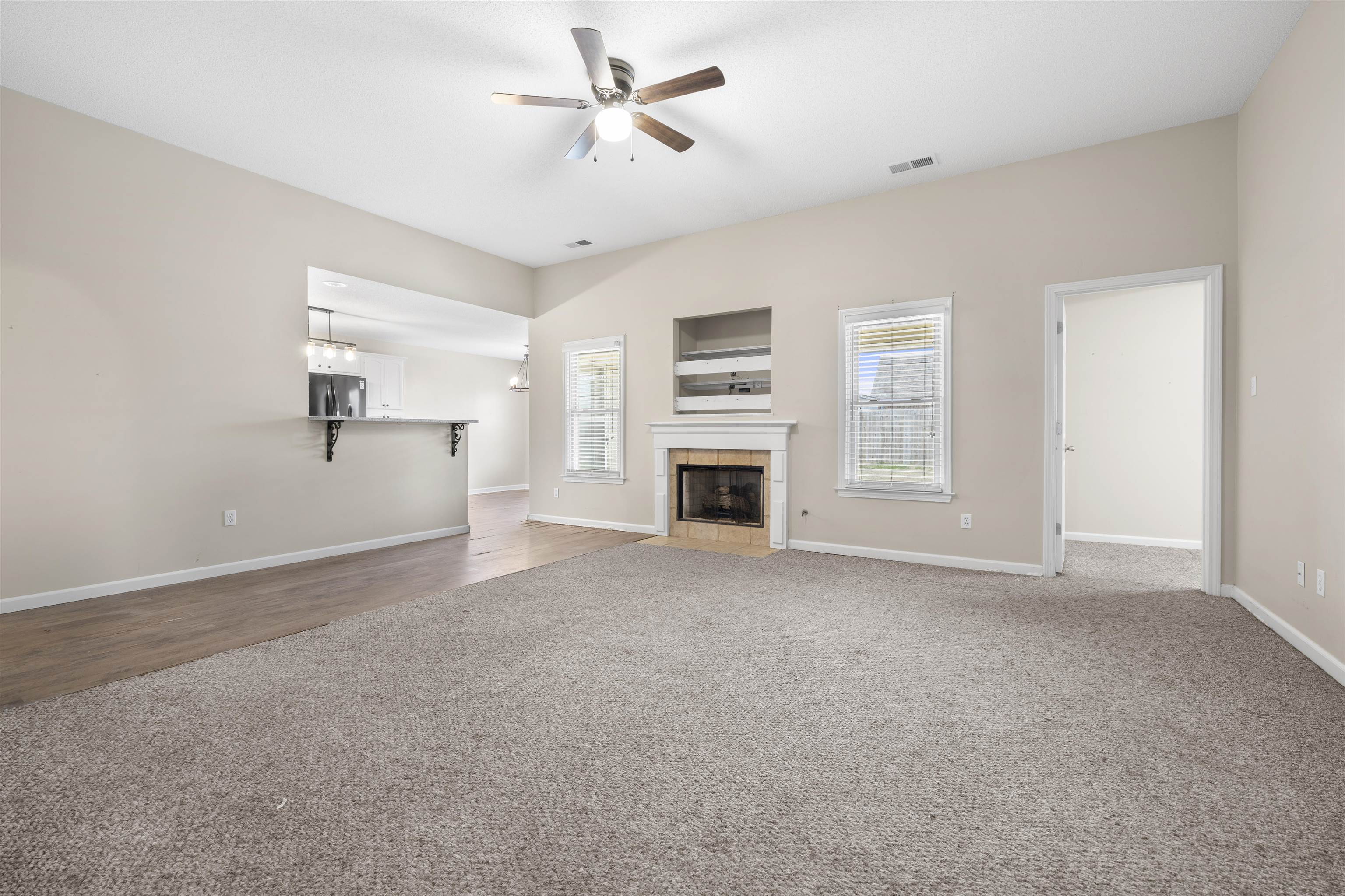 220 Terry Road Somerville, TN 38068 - Photo 9 of 29 a view of a livingroom with a ceiling fan and window