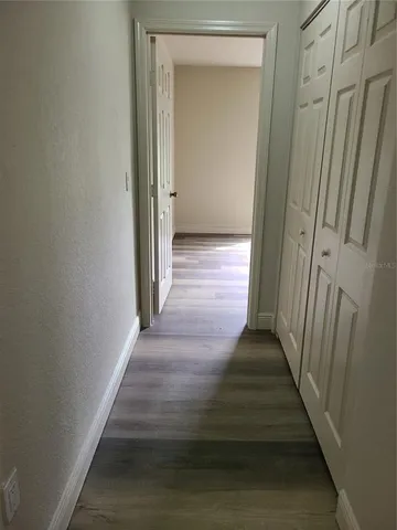 a bathroom with a sink a toilet and a shower