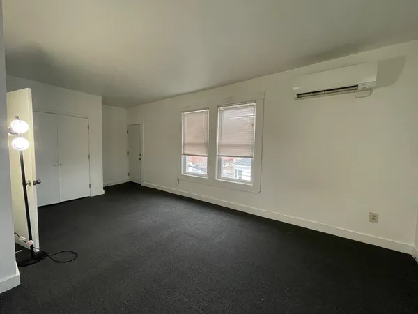 an empty room with a door