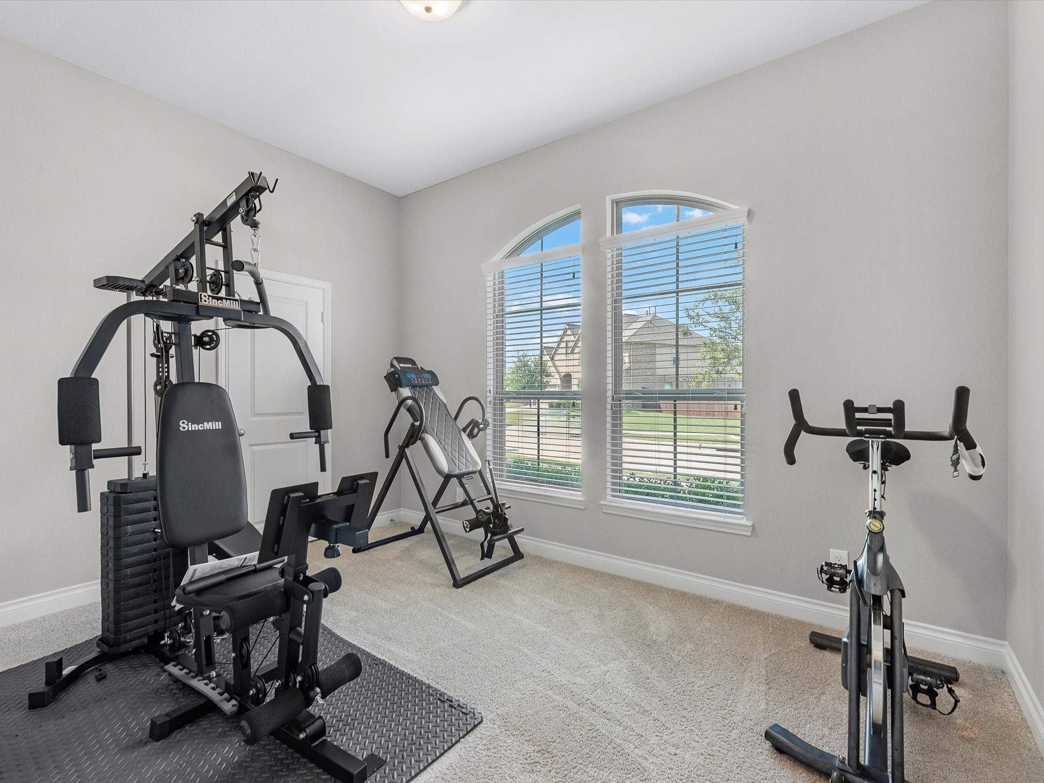 10135 Napier Drive Rosharon, TX 77583 - Photo 18 of 36 The first of the secondary bedrooms is located at the front of the home.
