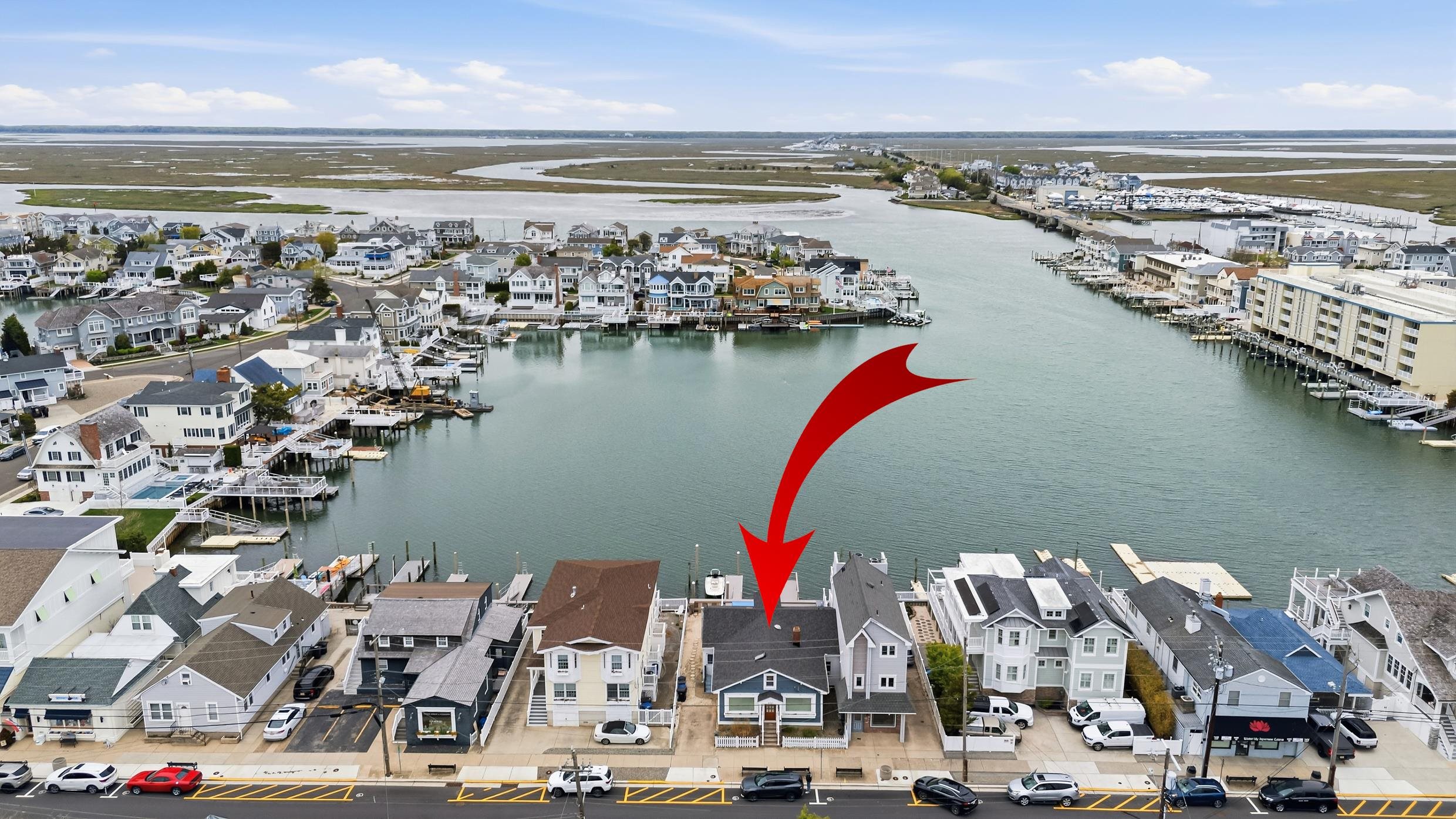 9727 3rd, Unit A1 Stone Harbor, NJ 08247 - Photo 3 of 20 a view of ocean and building