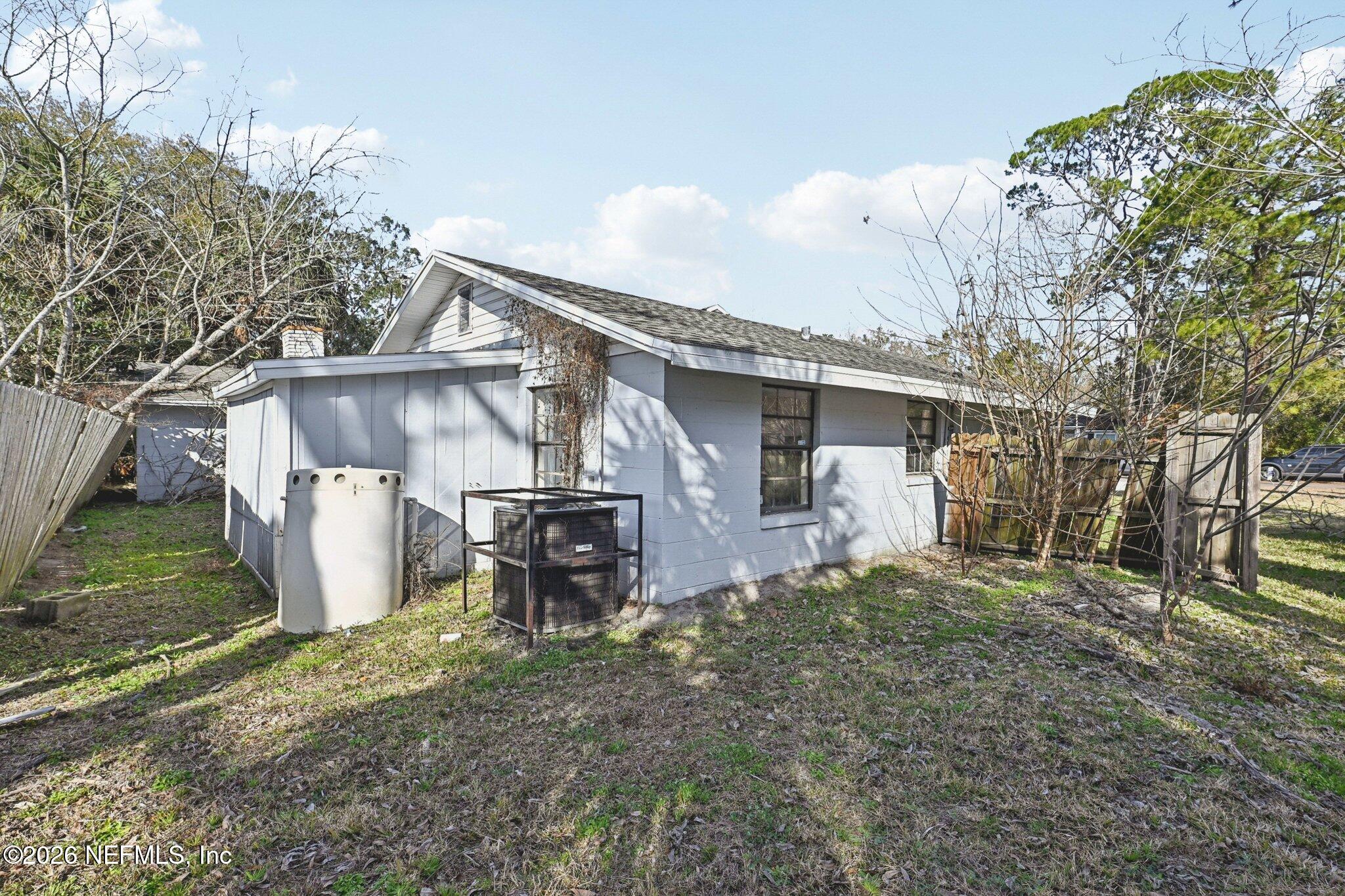 2914 Carleon Road Jacksonville, FL 32218 - Photo 39 of 39 a view of a house with backyard and a tree
