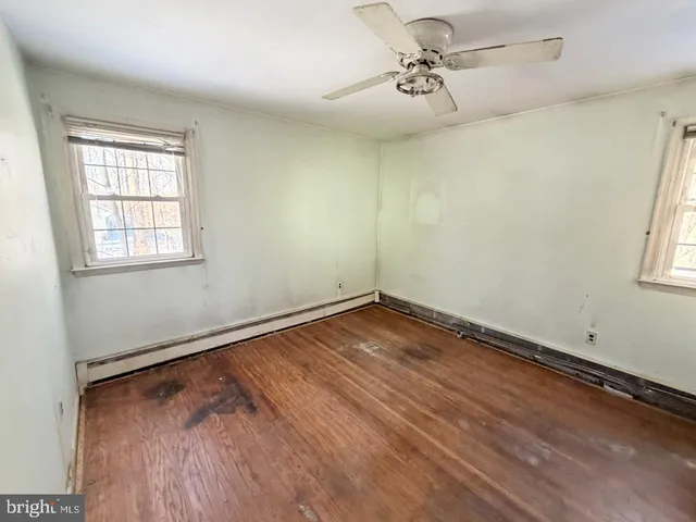 an empty room with windows