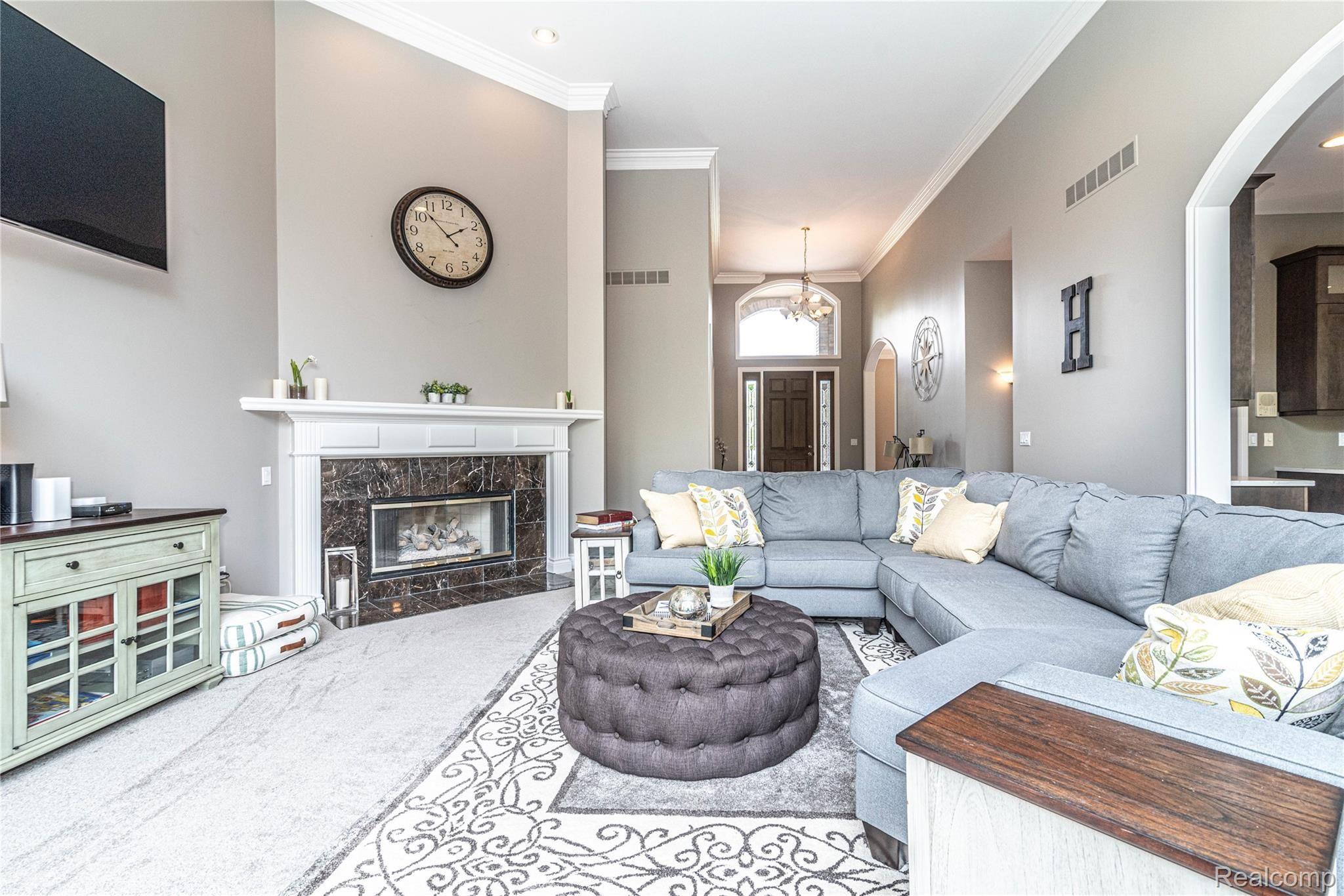 35265 Curtis Road Livonia, MI 48152 - Photo 10 of 52 Cozy up to the fire (gas) with a book, or have all your friends over for the game!