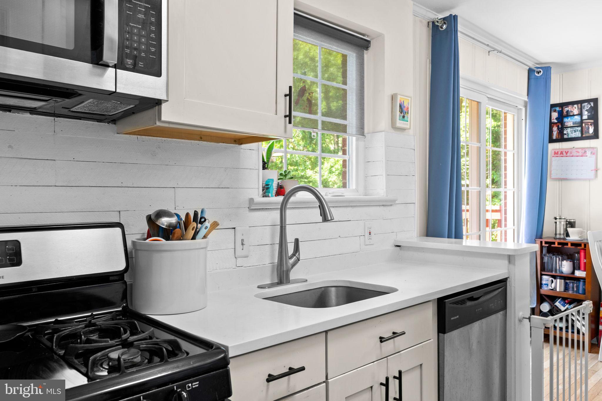 10310 Brunswick Avenue Silver Spring, MD 20902 - Photo 15 of 43 Bright and airy kitchen oasis.