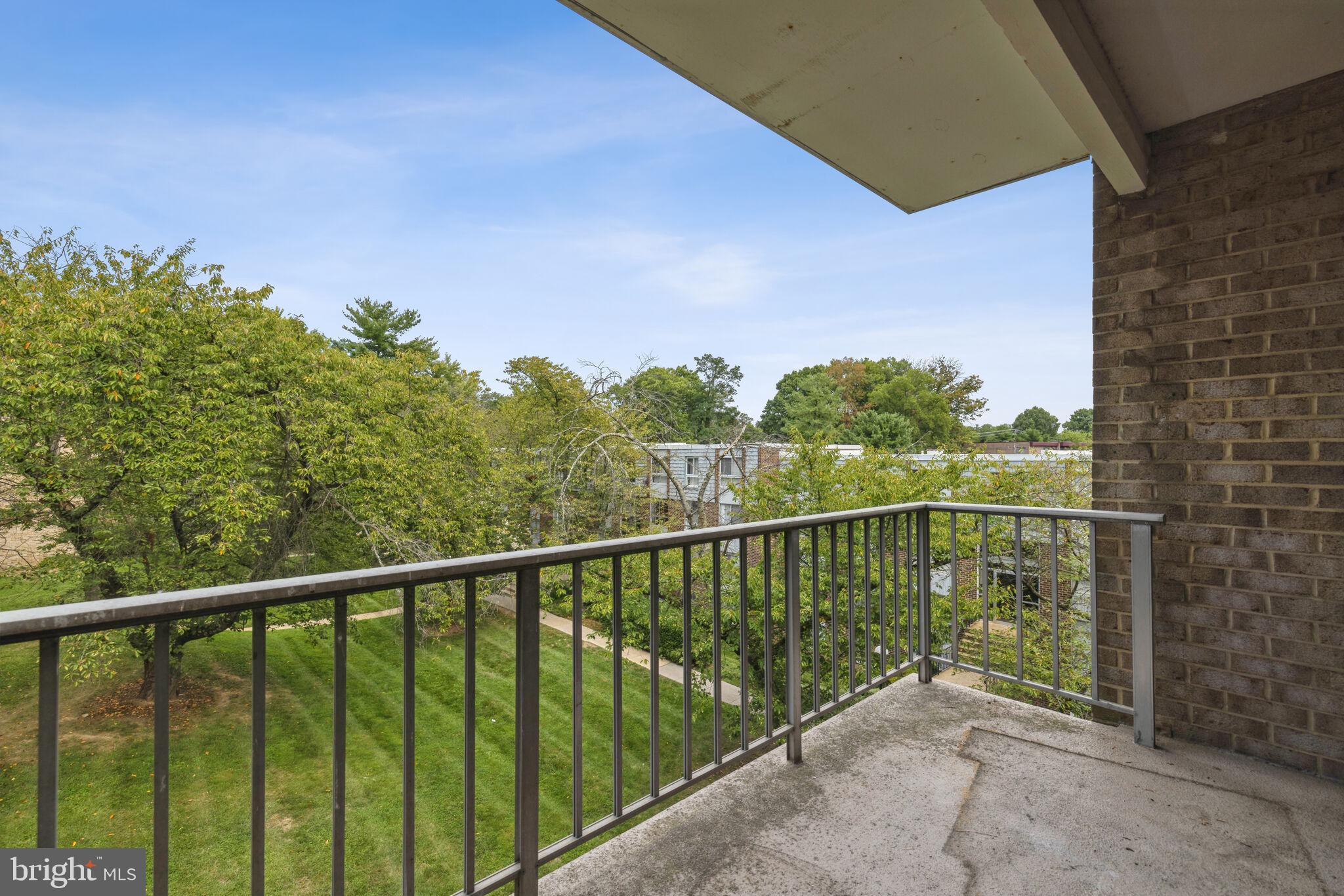 3906 Bel Pre Road, Unit 8 Silver Spring, MD 20906 - Photo 14 of 15 Spacious Balcony with View of Courtyard