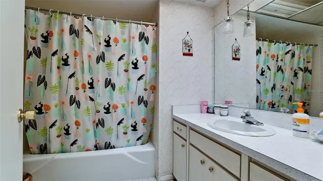 a view of a bathroom from the hallway