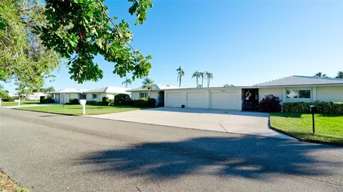 a view of a house with swimming pool