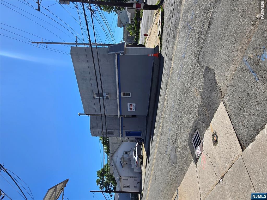 198 Kansas Street Hackensack, NJ 07601 - Photo 3 of 16 a view of a street