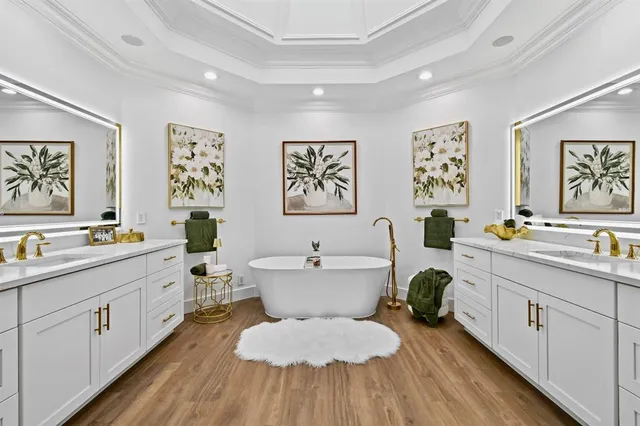 a view of a room with wooden floor and a window