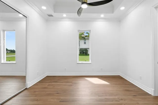 a view of kitchen with furniture and a window