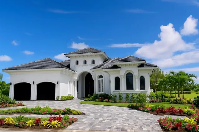 a front view of a house with a garden