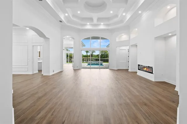 a kitchen with stainless steel appliances granite countertop a stove and a refrigerator