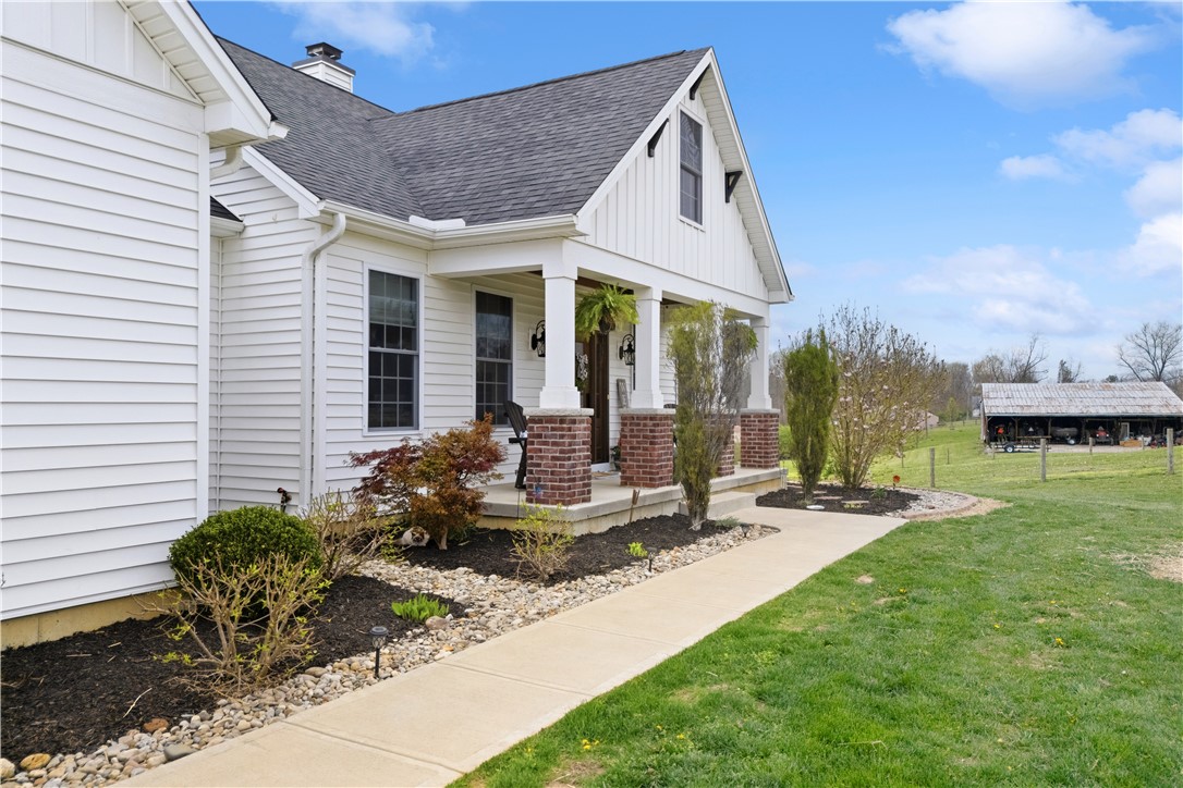 1158 Pyle Road Clarksville, OH 45113 - Photo 6 of 76 This charming home offers a welcoming facade with classic details and a spacious yard.