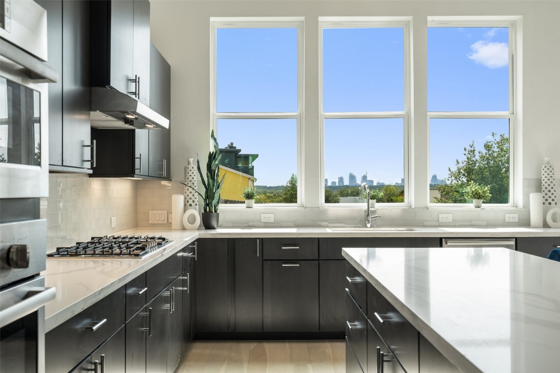 5500 Sendero Hills Parkway Austin, TX 78724 - Photo 11 of 23 a kitchen with a sink and a window