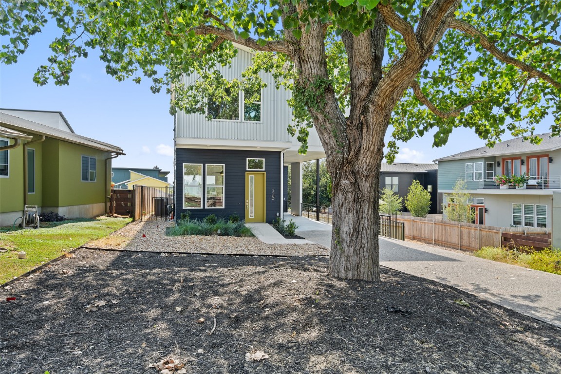 5500 Sendero Hills Parkway Austin, TX 78724 - Photo 2 of 23 a front view of a house with garden