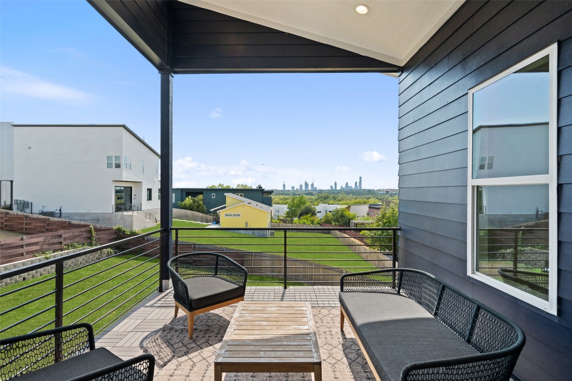 5500 Sendero Hills Parkway Austin, TX 78724 - Photo 21 of 23 a view of a patio with a table chairs and a backyard