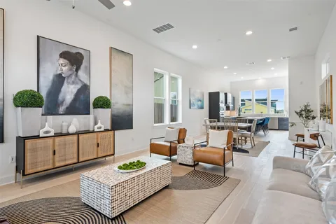 a living room with furniture and a table