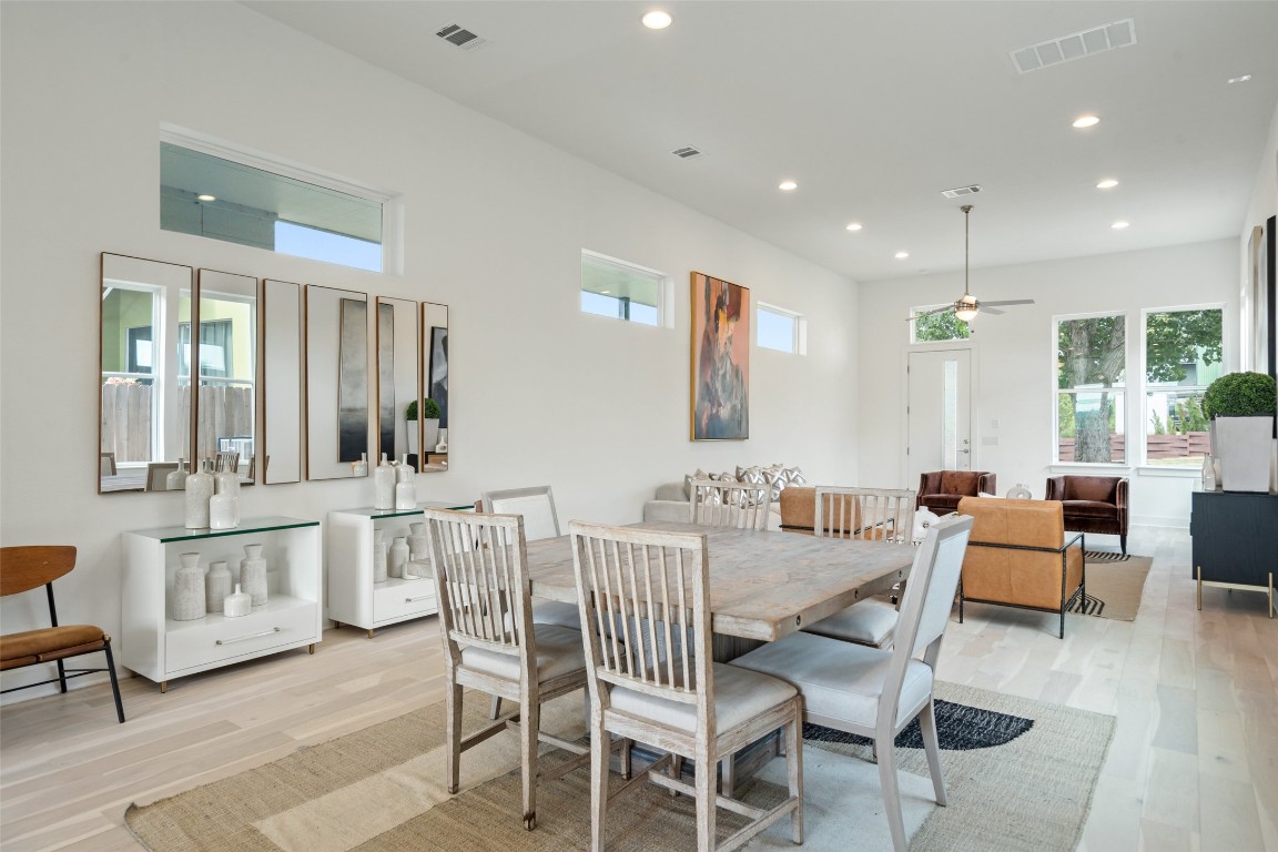 5500 Sendero Hills Parkway Austin, TX 78724 - Photo 9 of 23 a view of a a dining room with furniture window and wooden floor
