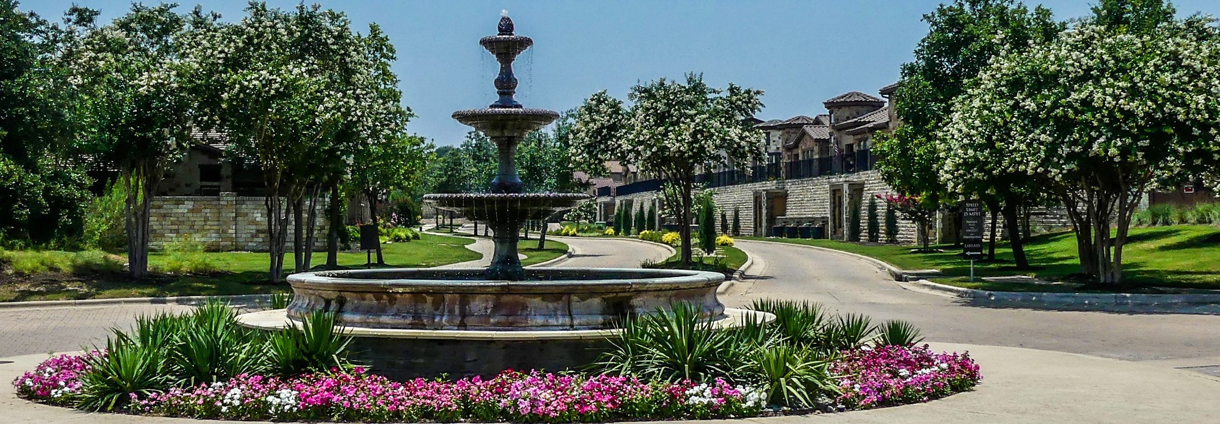 108-2 Rivalto Circle, Unit C3 Lakeway, TX 78734 - Photo 29 of 35 a view of a fountain with potted plants