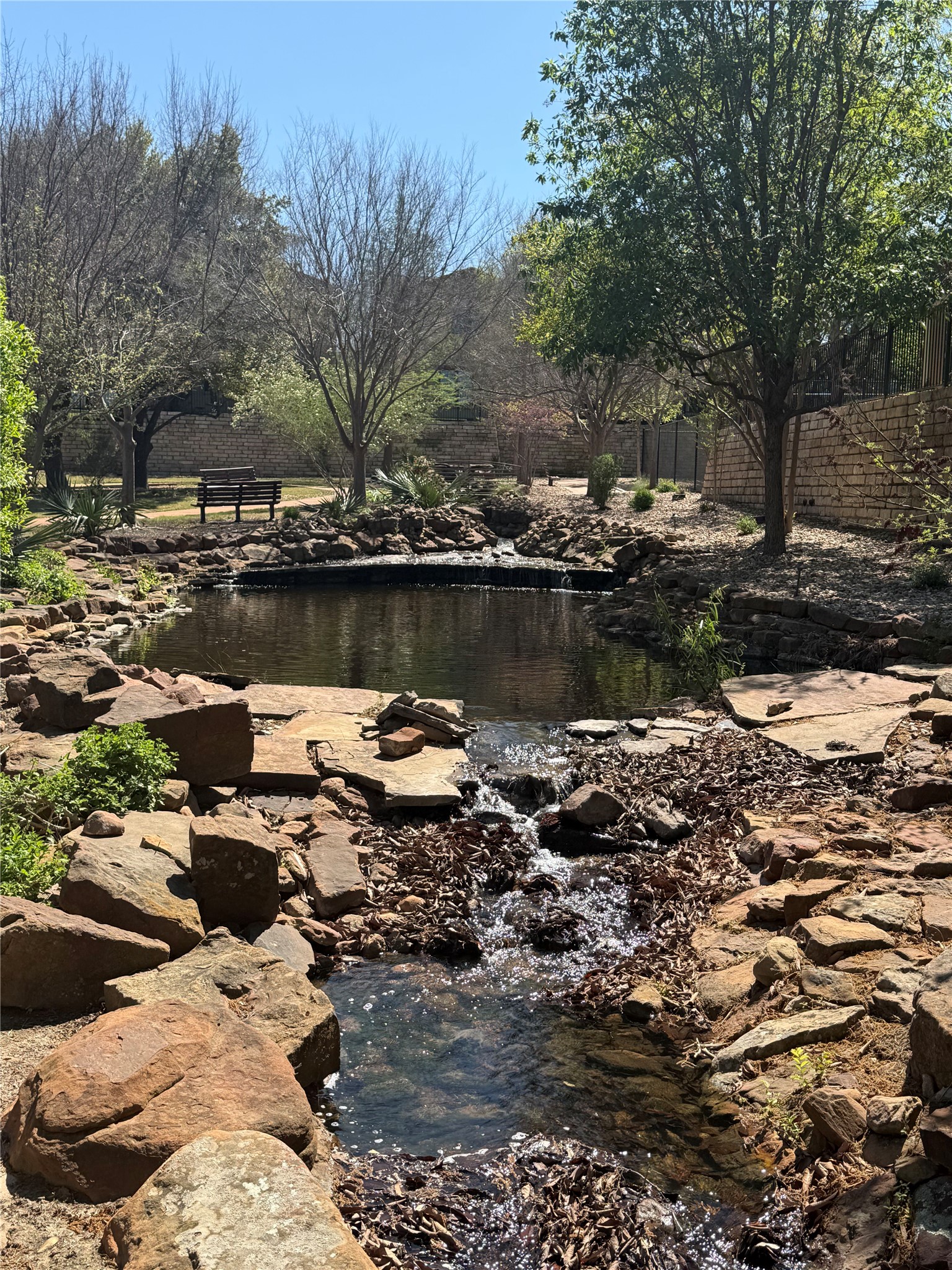 108-2 Rivalto Circle, Unit C3 Lakeway, TX 78734 - Photo 33 of 35 a view of a lake with houses