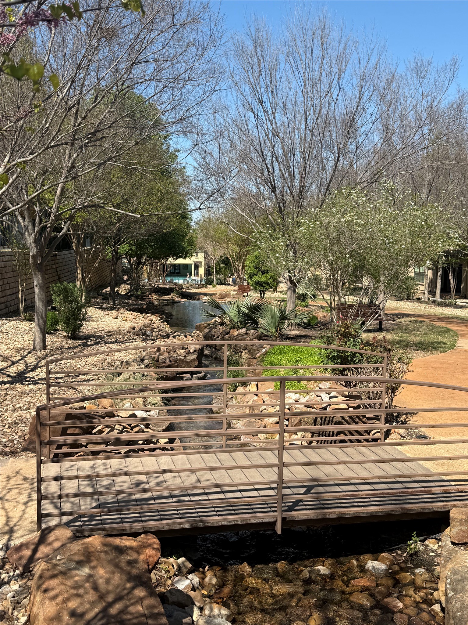 108-2 Rivalto Circle, Unit C3 Lakeway, TX 78734 - Photo 34 of 35 a view of a lake with a houses