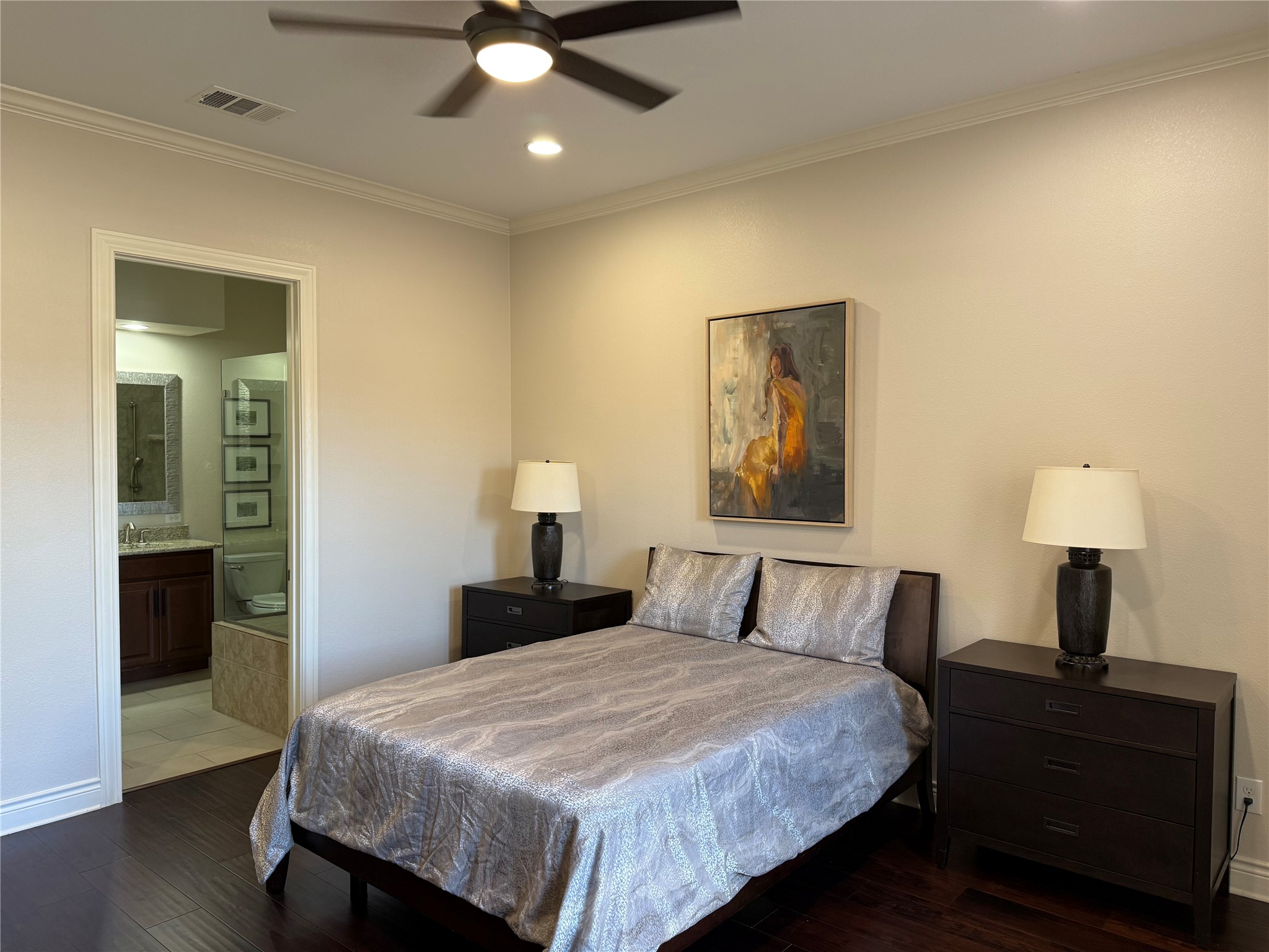 108-2 Rivalto Circle, Unit C3 Lakeway, TX 78734 - Photo 35 of 35 a bedroom with a bed and a lamp on table