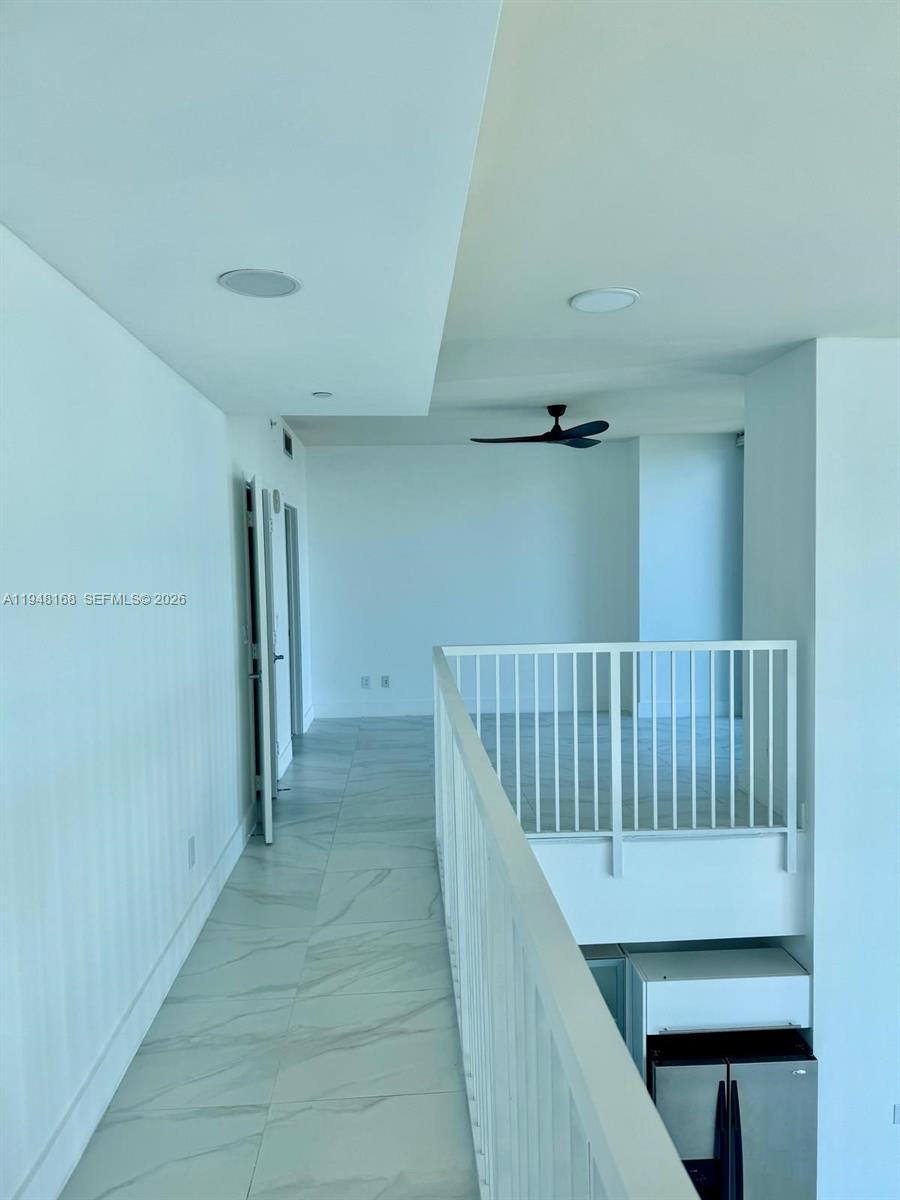 888 Biscayne Boulevard, Unit 906 Miami, FL 33132 - Photo 7 of 19 a view of a hallway