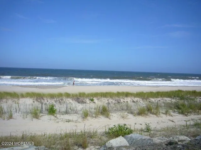 a view of a lake with a beach