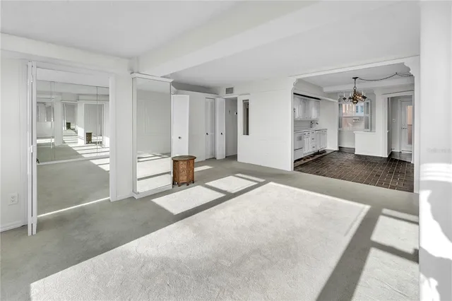 a bathroom with a shower a sink a toilet and a mirror