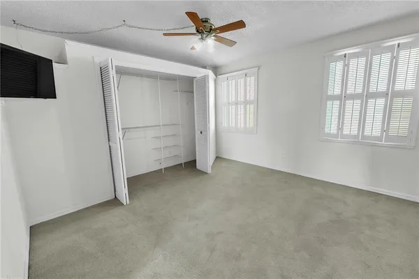 a view of balcony with furniture