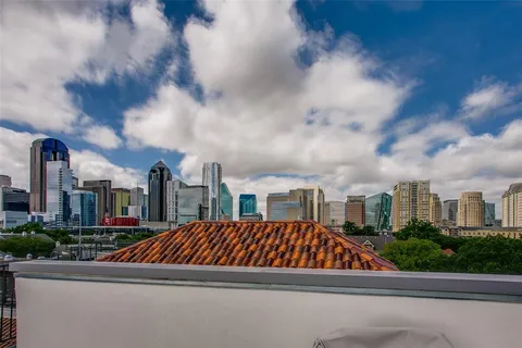 a view of a street in front of a building