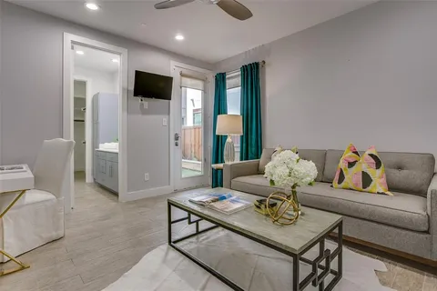 a living room with furniture and a table