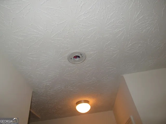 a close view of a stove and a microwave