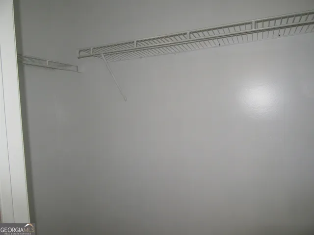 a bathroom with a sink a toilet and bathtub